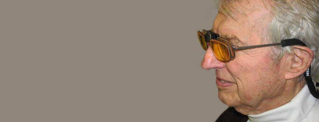 senior man with escoop glasses